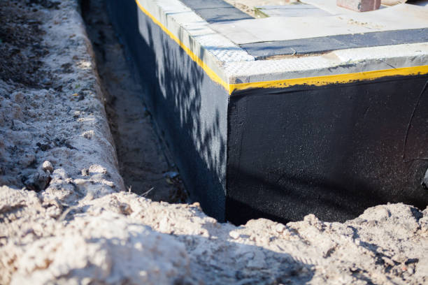 Professional Waterproofing technician working in Canton, IL